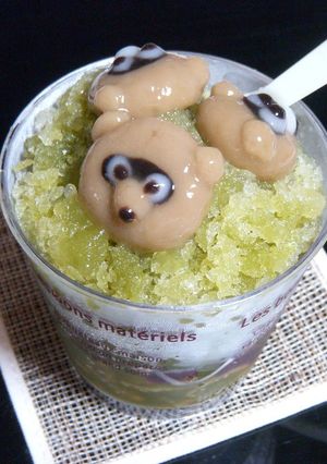 A picture of Matcha Green Tea Shaved Ice with Cute Mochi Balls.