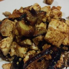 A picture of Fig & tofu stuffed mushrooms.