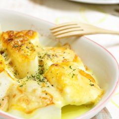 A picture of Fluffy Hanpen Fish Cakes Cooked in Aurora Sauce.
