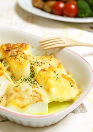 A picture of Fluffy Hanpen Fish Cakes Cooked in Aurora Sauce.