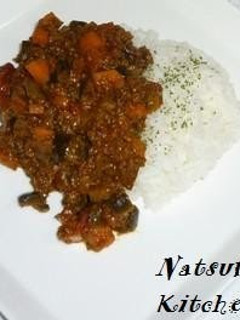 A picture of Dry Curry with Eggplant and Tomato.