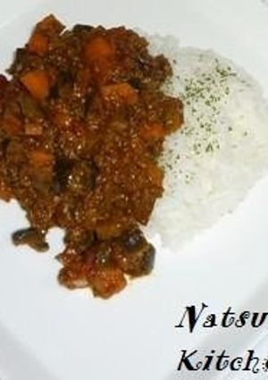 A picture of Dry Curry with Eggplant and Tomato.