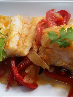 Una foto de Bacalao Encebollado