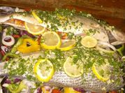 Una foto de corvina al limón