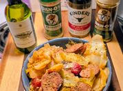 A picture of kielbasa and cabbage
