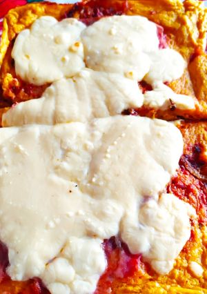 Una foto de Pizza de zapallo y zanahoria