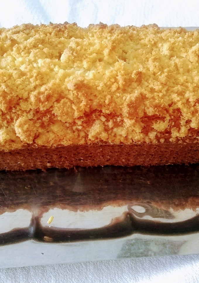 Una foto de Budín de dulce de leche con crumble de coco 🥥🫙🏵️