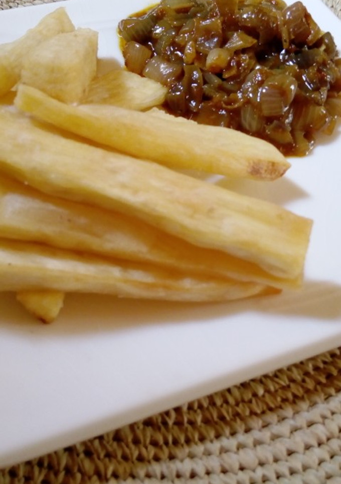 A picture of Yam fingers with onion source.