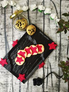 A picture of Eggless Nutella Stuffed Cookies and Vanilla Star Cookies.