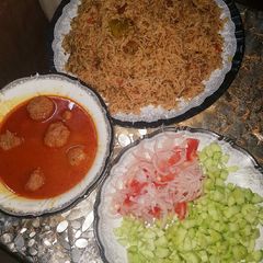 A picture of Achari Moon Pulao with Beef Kofta.