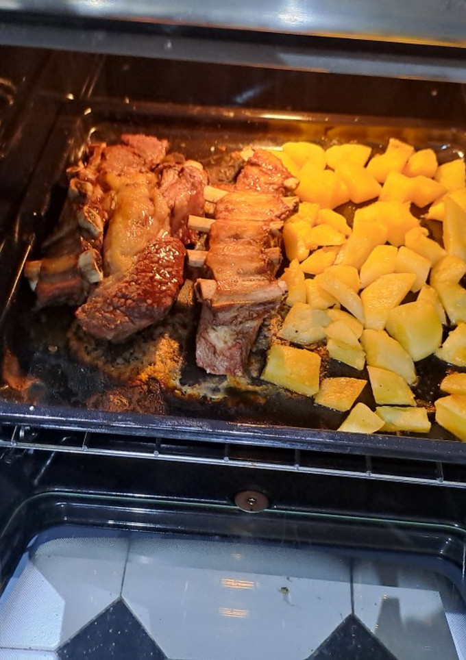 Una foto de Asado con papas al horno (y algún secretito)