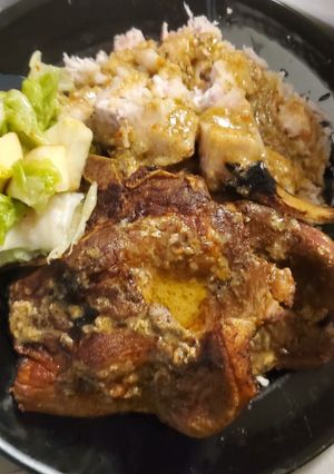 Una foto de Chuleta de cerdo y ñame a mi estiloo😉🇩🇴