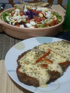 Una foto de Milanesa a la napolitana