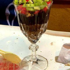 A picture of Chocolate Brownie with Fruits Topping.