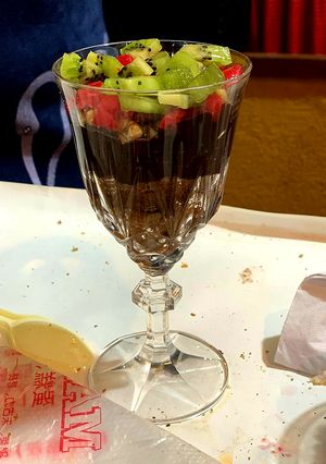 A picture of Chocolate Brownie with Fruits Topping.
