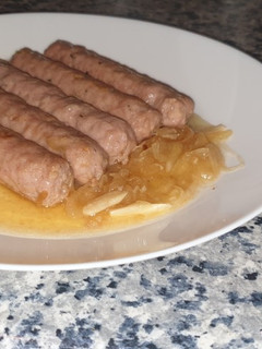 Una foto de Salchichas al vino