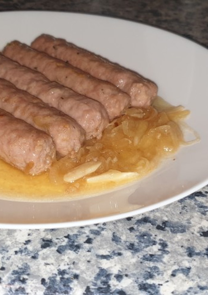 Una foto de Salchichas al vino