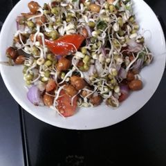 Sprouted moong beans and black gram salad A picture of Sprouted moong beans and black gram salad.