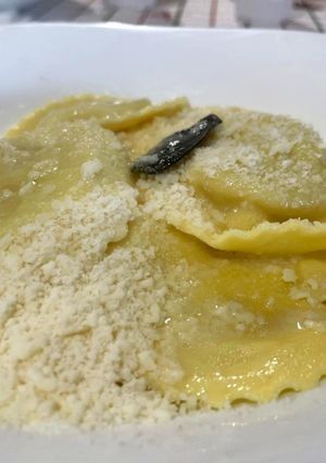 A picture of Gorgonzola-Stuffed Ravioli with Butter, Sage, and Grated Parmesan.