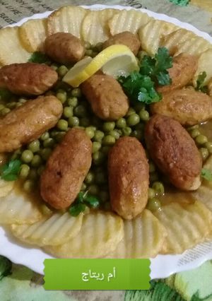صورة لوصفة طاجين الجلبانة بكروكات الدجاج