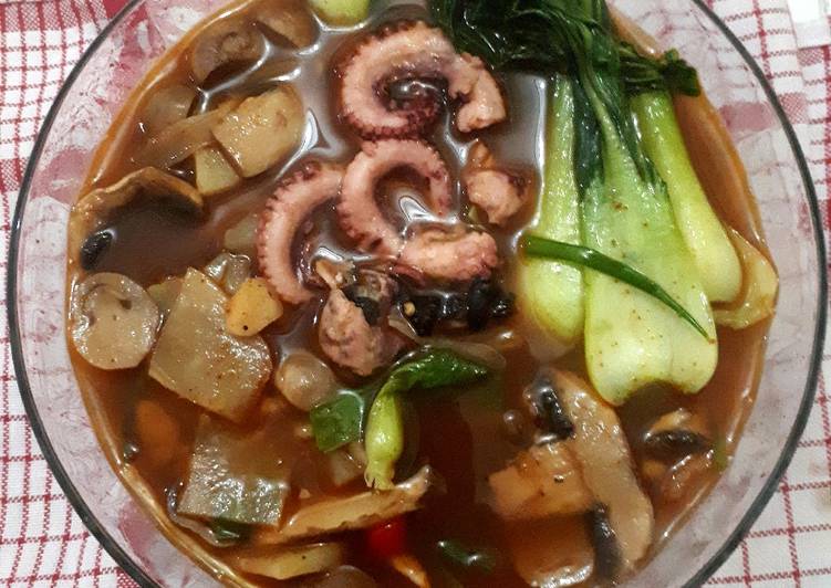 Octopus with mushrooms soup
