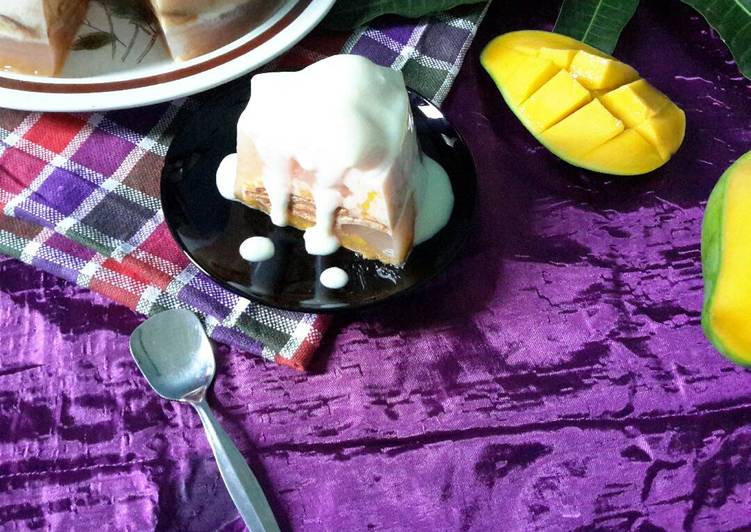 Puding mangga berlapis biskuit marie