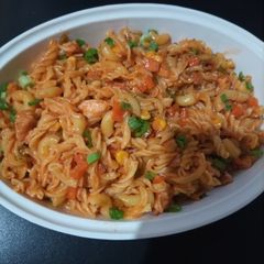 A picture of Spiral macaroni pasta.