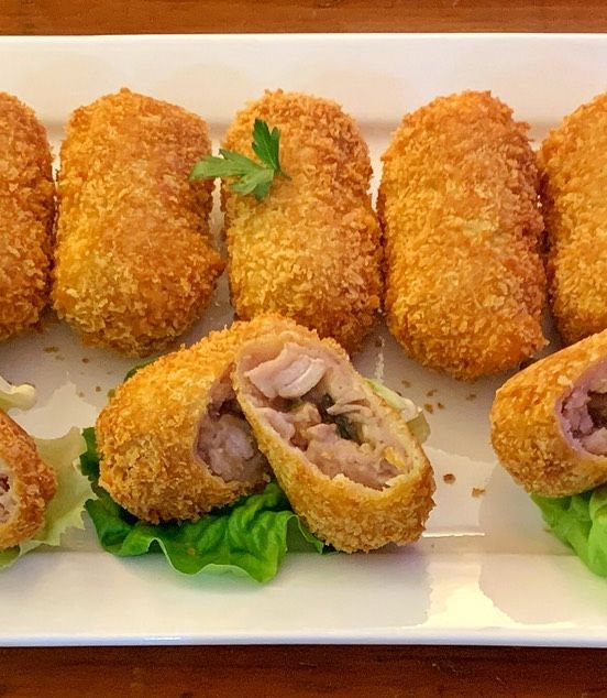 A picture of Taro croquettes with char siu pork stuffing.