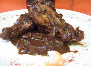 Una foto de Pollo al champagne y chocolate