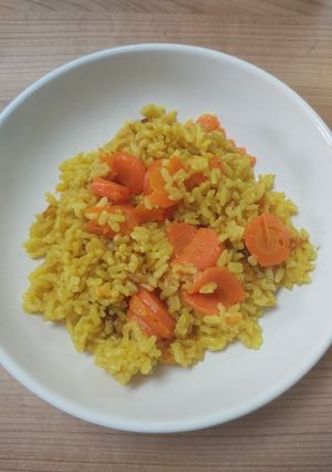 Une photo de Risotto aux carottes et curry