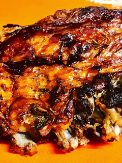 Una foto de Costillar al horno macerado y con salsa barbacoa asado lentamente