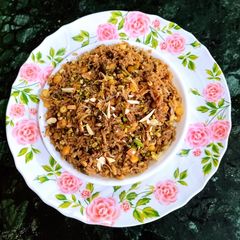 A picture of Jaggery Khichdi With Sprouts.