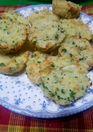 Una foto de Croquetas de arroz con cebolla y queso al horno