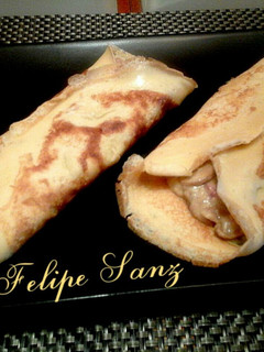 Una foto de Crepes rellenos de champiñon y jamón