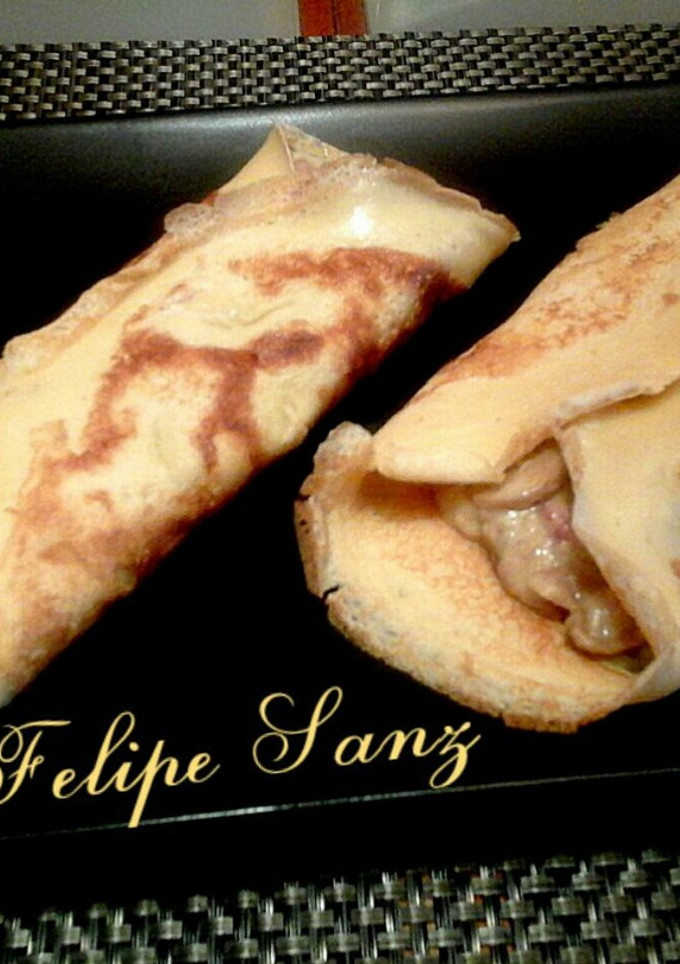Una foto de Crepes rellenos de champiñon y jamón