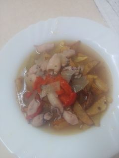 Una foto de Chipirones con patatas fritas