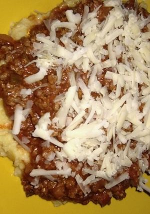 Una foto de Polenta con tuco (salsa boloñesa)