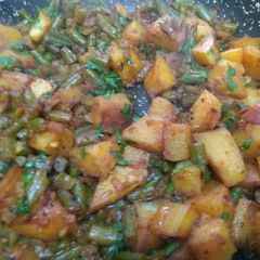 A picture of Fish with potato dry masala.
