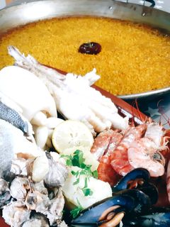Una foto de Arroz a banda
