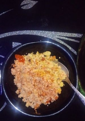 A picture of Scrambled eggs and ugali.
