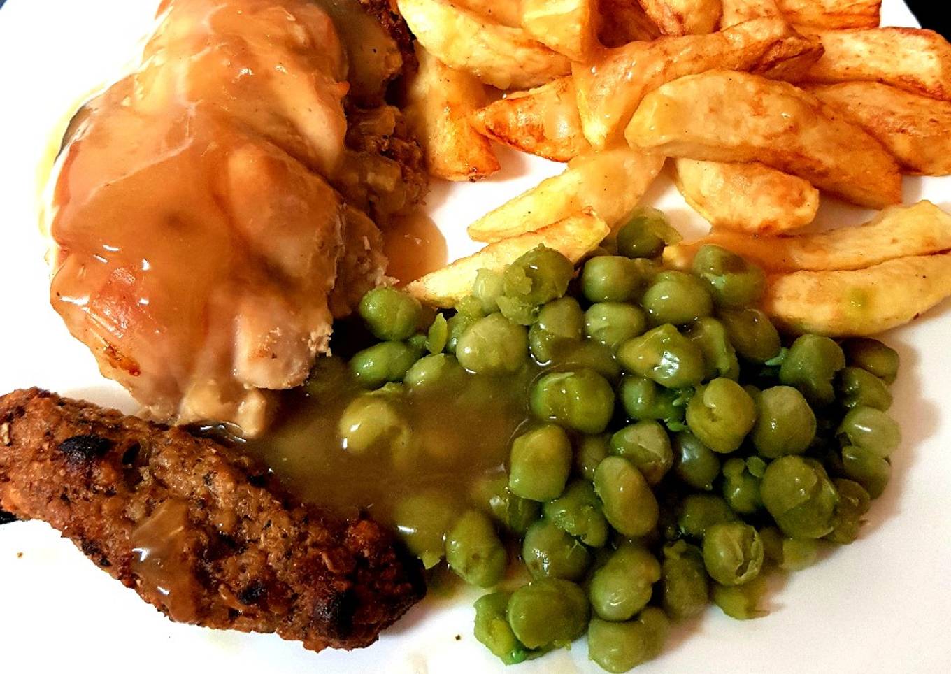 My Stuffed Peppered Chicken breast with Homemade Chips + Peas