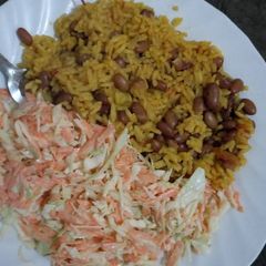 A picture of Rice Beans and coleslaw.