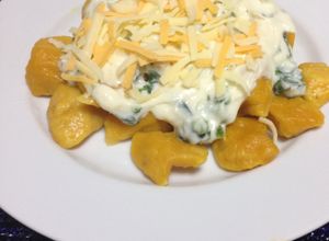 Una foto de Ñoquis de Zapallo(calabaza)con Bechamel y Espinaca