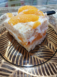 Una foto de Postre de durazno vainillas y crema