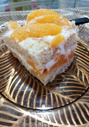 Una foto de Postre de durazno vainillas y crema