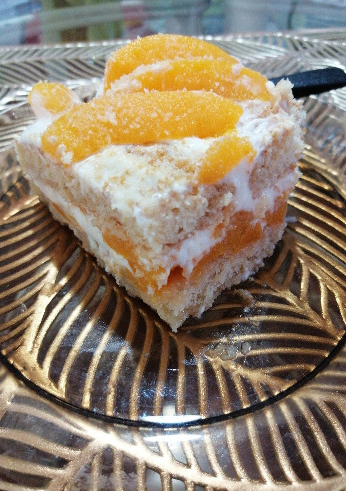 Una foto de Postre de durazno vainillas y crema