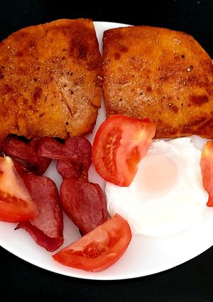 A picture of My Egg Bacon,Tomato with the Red Potato Tatties 😍.