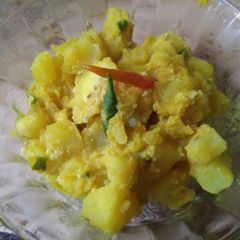 A picture of Aloo posto (potato with Poppy seed paste).