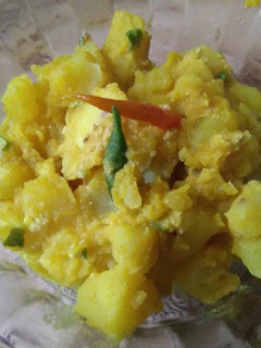 A picture of Aloo posto (potato with Poppy seed paste).
