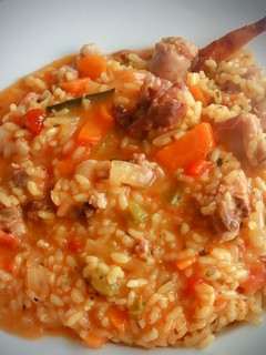 Una foto de El ArrozCaldoso con picada de almendras y "alGusto" de Can Llums